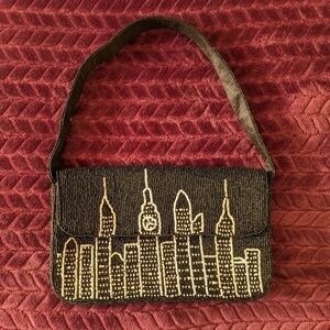 Elegant Black and Gold Beaded Cityscape Clutch